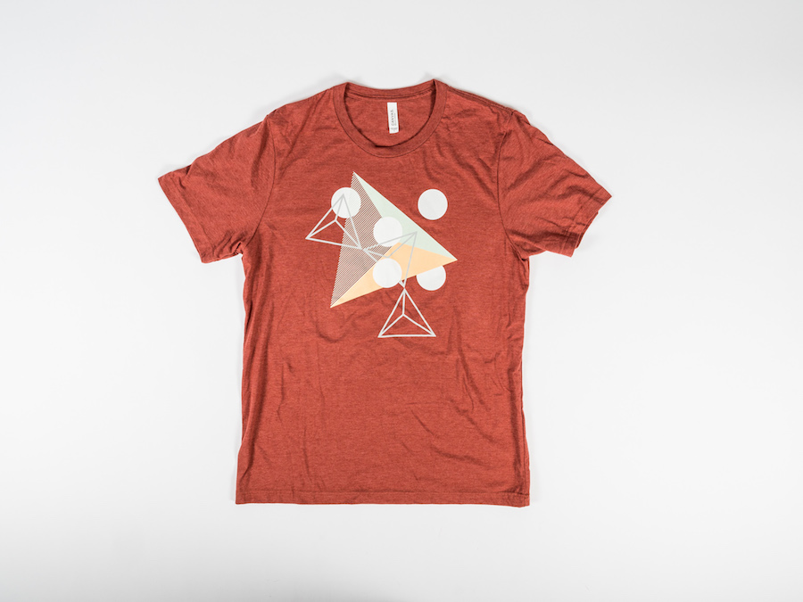 ArtPrize clay triangle t-shirt with multi colored shapes featured on the Grand Rapids Store