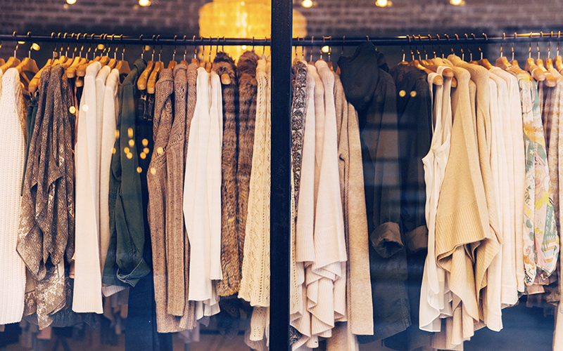 Garments hanging on rack, and featured in MarkIt Merchandise's blog.
