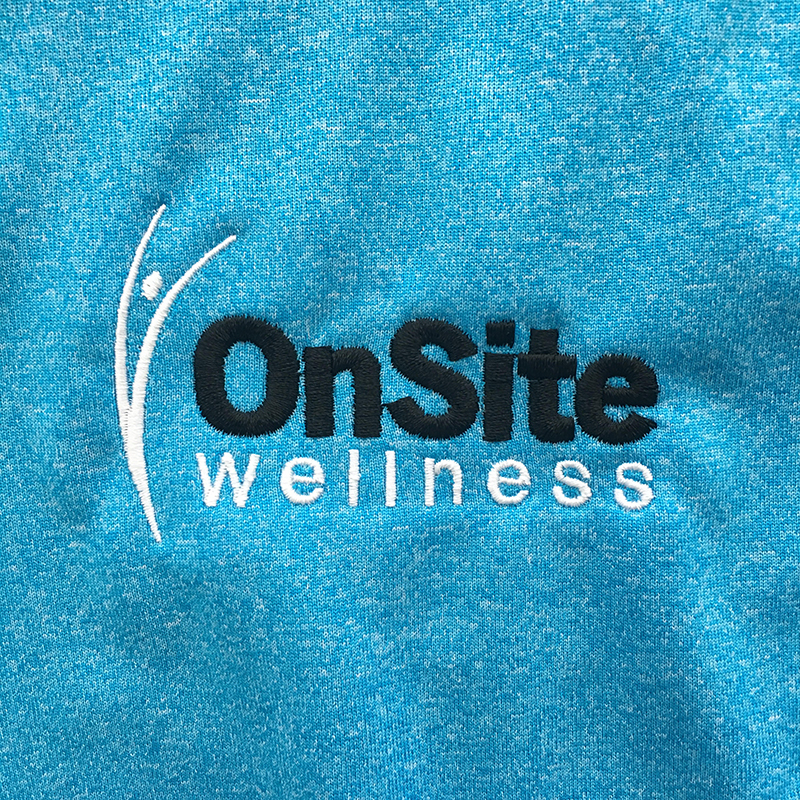 Black and white OnSite Wellness. Embroidered on MarkIt Merchandise.