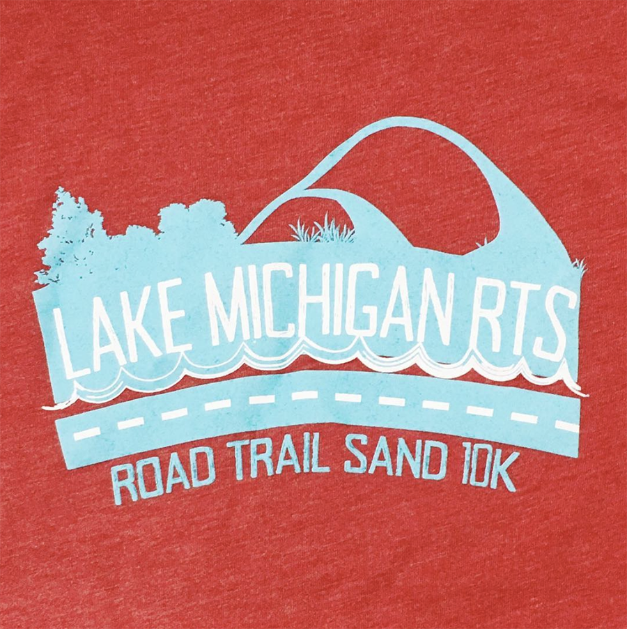Lake Michigan Road Trail Sand 10K Screen printed artwork on red t-shirt with light blue and white artwork.