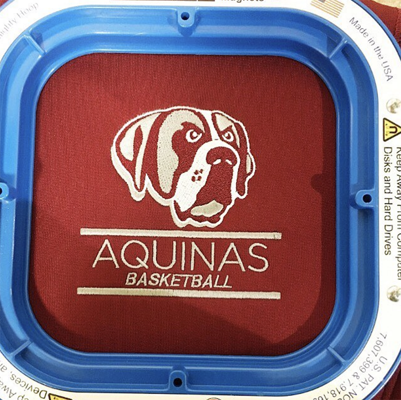 Aquinas Basketball bull dog embroidery. Embroidered at MarkIt Merchandise.