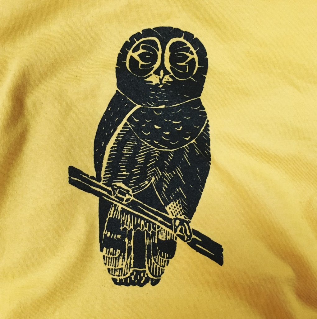 Owl, screen printed at MarkIt Merchandise, on yellow shirt